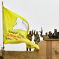 Syrian Kurdish fighters raise their flag in March after overrunning the last vestige of the Islamic Strate group's "caliphate" in a US-backed offensive they had hoped would earn them Western support for their dreams of self-rule