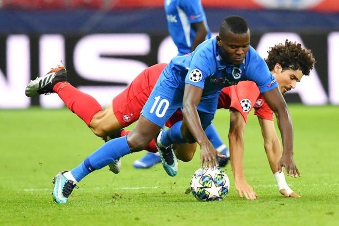 Mbwana Samatta, in the blue of Genk, scraps for possession in the Belgian side's defeat against Salzburg with which they began their Champions League campaign