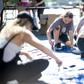 Nora Gell (center), 14, paints cardboard waves in Brooklyn on September 15, 2019 for the climate strike protests planned for September 20