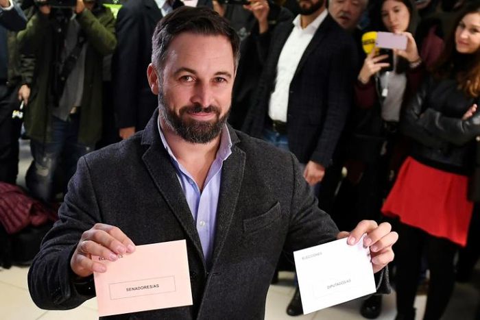 Vox's far-right candidate Santiago Abascal poses with his ballots in Madrid as his party looks for a surge in support