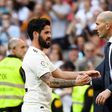 Real Madrid's Spanish midfielder Isco (L) celebrates scoring the opening goal with Real Madrid's French coach Zinedine Zidane during the Spanish league football match between Real Madrid CF and RC Celta de Vigo at the Santiago Bernabeu stadium in Madri...