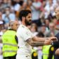 Real Madrid's Spanish midfielder Isco (L) celebrates scoring the opening goal with Real Madrid's French coach Zinedine Zidane during the Spanish league football match between Real Madrid CF and RC Celta de Vigo at the Santiago Bernabeu stadium in Madri...