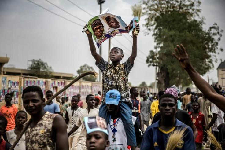 Supporters of President Muhammadu Buhari celebrated his election victory last month, but the violence that marred some polls that have had to be re-run appeared to have returned Saturday