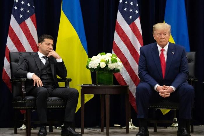 Accusations US President Donald Trump pressured Ukrainian President Volodymyr Zelensky (L) have triggered an impeachment probe