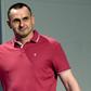 Freed Ukrainian film director Oleg Sentsov greets journalists on Tuesday