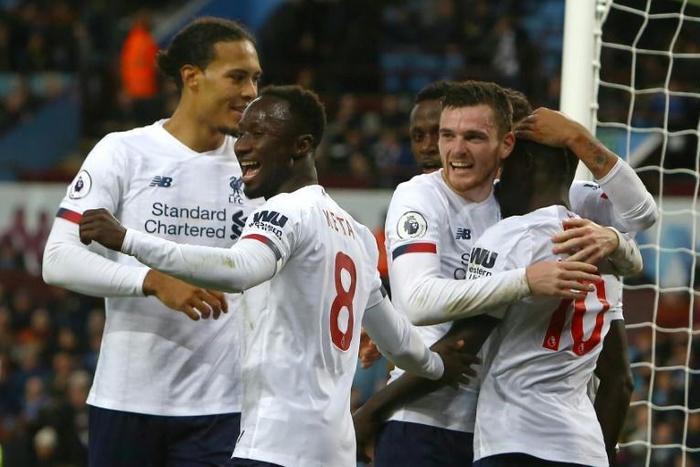 Liverpool celebrate their late fightback at Aston Villa