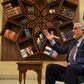 Afghan Chief Executive Abdullah Abdullah gestures during an interview with AFP at the Sapedar Palace in Kabul