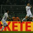 Werder Bremen forwards Milot Rashica (R) and Max Kruse (L) scored all their sides goals in a shock 3-1 Bundesliga win at Bayer Leverkusen on Sunday.