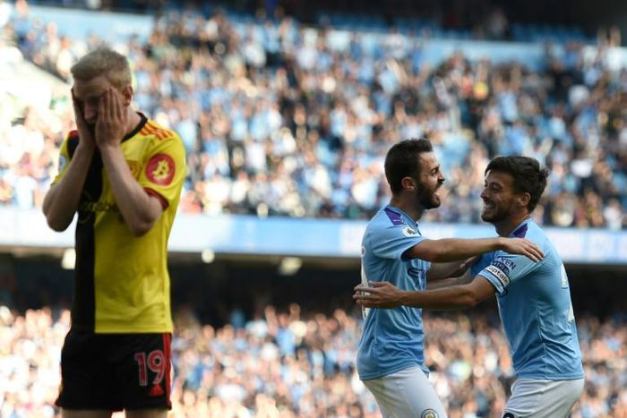 Manchester City's Bernardo Silva (C) celebrates a goal in his side's rout of Watford
