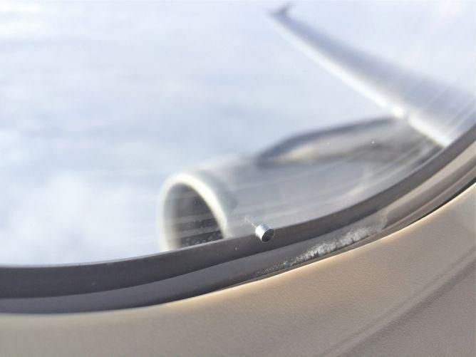 Airplane window hole