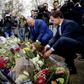 Polls show the centre-right coalition of Dutch premier Mark Rutte (R), seen here paying tribute to the Utrecht attack victims, is headed for major losses