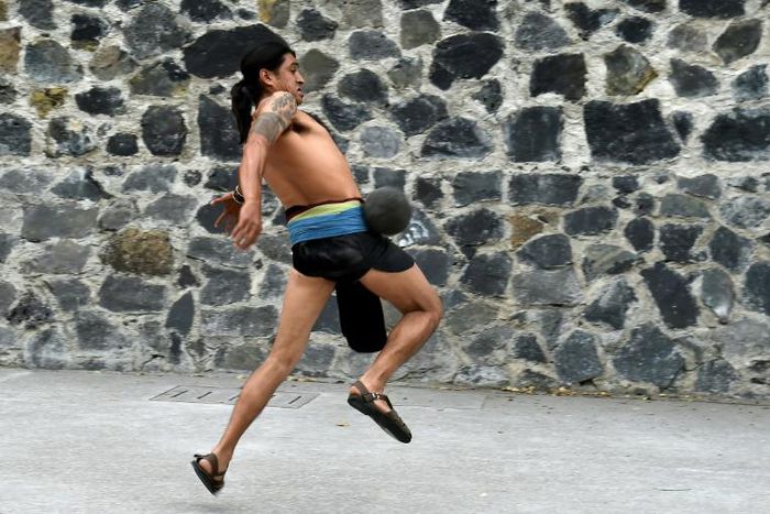 A man plays a pre-Columbian ballgame called "ulama," a ceremonial sport that dates back 3,500 years and is experiencing a renaissance in Mexico City