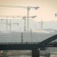 A man rides a bicycle on one of Belgrade's bridges on October 27, 2019. Serbian health authorities warned on October 27, 2019, against "very high" air pollution in Belgrade and several other cities in the country, a situation that has persisted for sev...