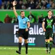 German referee Tobias Stieler overturning Wolfsburg's goal