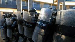 Police clash with protesters demanding the resignation of Honduran President Juan Orlando Hernandez