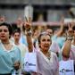 Women dressed as 1950's icon Eva Peron take part in a demonstration against President Mauricio Macri as campaigning for Argentina's October 27 elections heats up
