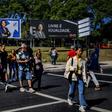 Anti-racism activist Joacine Katar Moreira, seen on the billboard on the right, is the best-known of the three new lawmakers