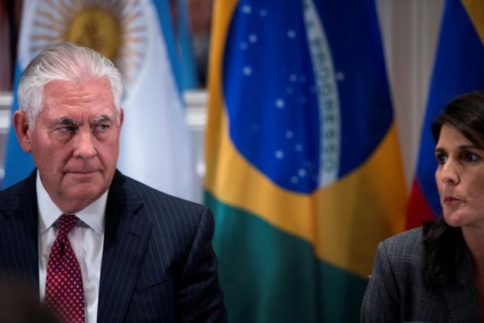 Then-US Secretary of State Rex Tillerson listens as then-UN Ambassador Nikki Haley speaks during an event in New York on September 18, 2017