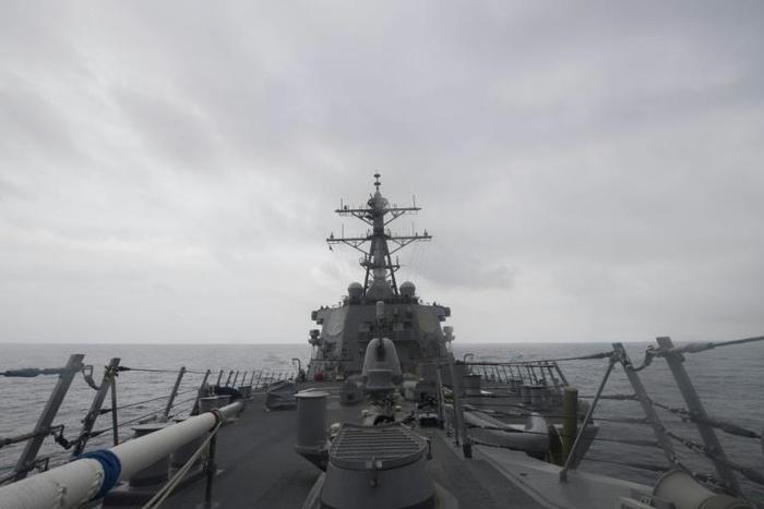 The US military has been using guided-missile destroyers like this one, the USS John McCain, seen here in a US Navy photo, as it seeks to enforce an international 'freedom of operation' near islands claimed by Beijing in the South China Sea