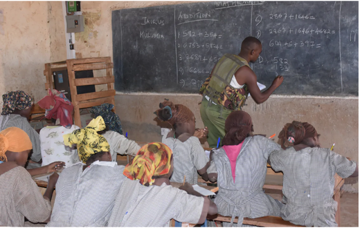 Police officer dumps his gun to teach mathematics as teachers fail to show up over insecurity