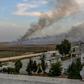 Smoke rises from the Syrian town of Tal Abyad, in a picture taken from the Turkish side of the border on October 10, 2019, on the second day of Turkey's military operation against Kurdish forces