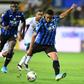 Luis Muriel, here shooting against Torino, bagged a hat-trick as Atalanta closed in on Serie A leaders Juventus