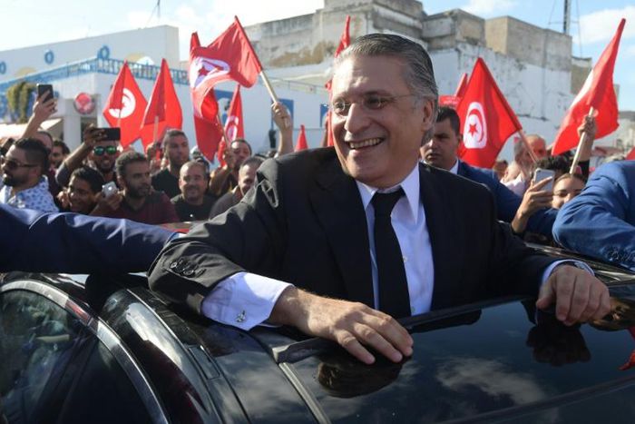 Tunisian presidential candidate Nabil Karoui meets his supporters in the northern city of Bizerte on October 11, 2019 two days before a runoff vote pitting him against independent conservative academic Kais Saied
