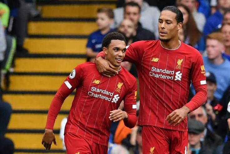 Liverpool defender Trent Alexander-Arnold (L) opened the scoring at Chelsea