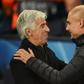 Atalanta coach Gian Piero Gasperini (L) is greeted by Manchester City's Spanish manager Pep Guardiola (R) at the Etihad Stadium on October 22, 2019.