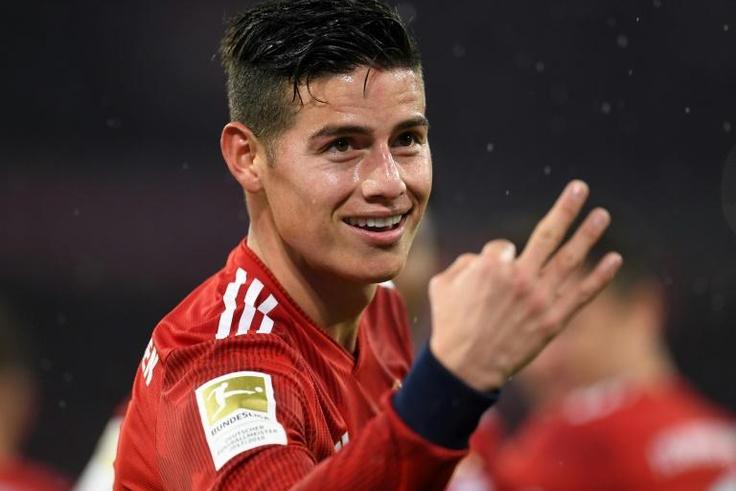 Bayern Munich's James Rodriguez celebrates after scoring a hat-trick in Sunday's 6-0 thrashing of Mainz at the Allianz Arena