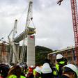 The first deck of Genoa's new bridge was lifted into position just over a year after the collapse that killed 43 people