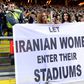 Supporters hold a banner calling for Iranian women to be allowed to enter football stadiums, during a match between Sweden and Iran in Solna near Stockholm in March 2015