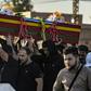 Mourners attend the funeral of five Syrian Democratic Forces fighters killed in battles against Turkey-led forces in the flashpoint town of Ras al-Ain