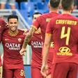 AS Roma's Dutch forward Justin Kluivert (2ndL) celebrates with Bosnian Edin Dzeko (L) after scoring his team's fourth goal against Sassuolo.