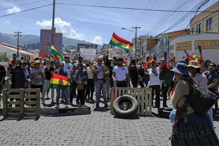 People demonstrate during a general strike in la Paz, Bolivia on October 25, 2019.Bolivian President Evo Morales declared victory Thursday in elections whose disputed results have triggered riots, a general strike and opposition charges that he is tryi...