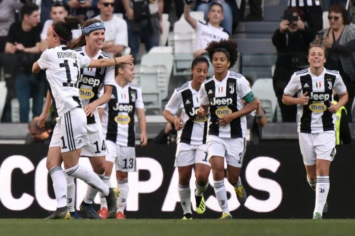 Danish midfielder Sofie Junge Pedersen (2ndL) celebrates after scoring the winning goal for Juventus's women's team against Fiorentina.