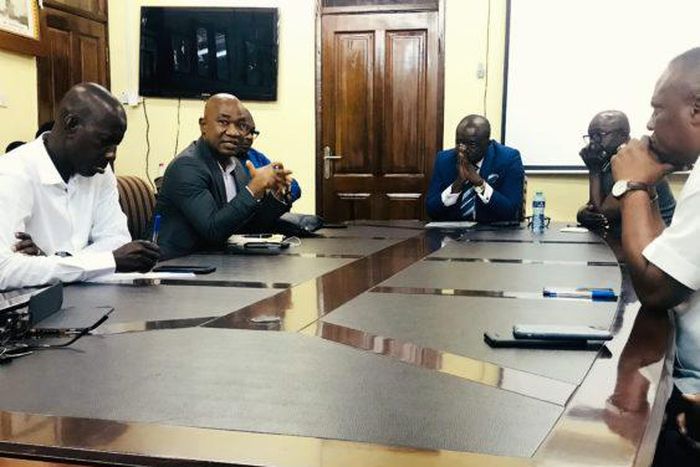 Kurt Okraku and GFA Executive Council members interact with staff