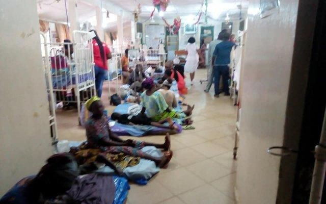 Children treated on bare floor due to lack of beds