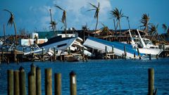 Destroyed boats are pushed up against the pier in the aftermath of Hurricane Dorian in Treasure Cay on Abaco Island, Bahamas