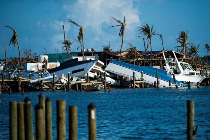 Destroyed boats are pushed up against the pier in the aftermath of Hurricane Dorian in Treasure Cay on Abaco Island, Bahamas