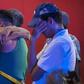 People try to console each other after 25 died in a fire in a bar in Mexico's violent Veracruz state