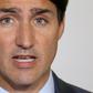 Canada's Prime Minister Justin Trudeau announced two measures aimed at wooing middle-class voters but once again had to defend himself after images showing him in blackface emerged