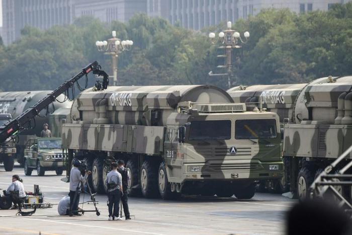 Military vehicles carrying DF-31AG intercontinental ballistic missiles participated in the military parade at Tiananmen Square