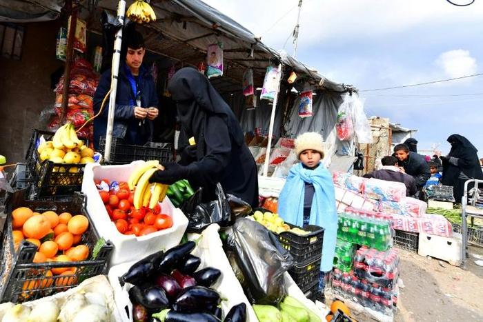 Despite the fruit and vegetables on display at the market, there is far from enough food for residents of the severely overcrowded Al-Hol camp