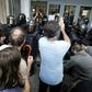 Spanish police officers clash with people outside a polling station in Barcelona, on October 1, 2017, on the day of a referendum on independence for Catalonia banned by Madrid