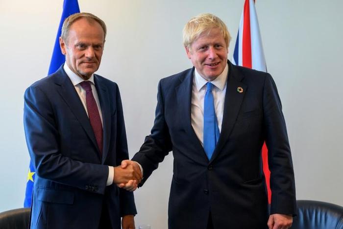Donald Tusk (L), President of the European Council, and Boris Johnson, Prime Minister of the United Kingdom, meet at the United Nations September 23, 2019, in New York.