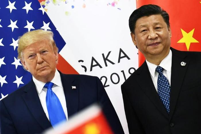 President Donald Trump says the US and China are working on a new location for the signing of a trade deal with China's leader Xi Jinping