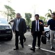 Premchai Karnasuta (left), who is charged with a slew of offences related to poaching, arrives at court to hear the verdict