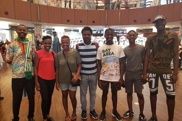 2019 NSMQ champions having fun with quiz mistress Dr Elsie Kaufmann in Dubai