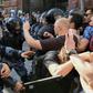 A Russian court sentenced a protester to three years in prison for attacking a policeman during recent anti-government demonstrations